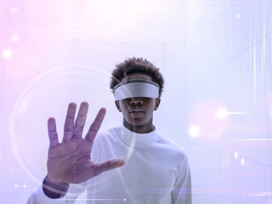 Man wearing smart glasses touching a virtual screen futuristic technology digital remix